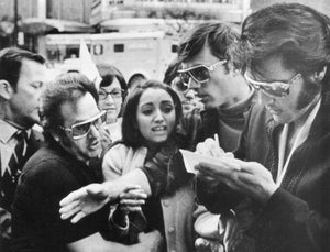 Elvis signing autographs
